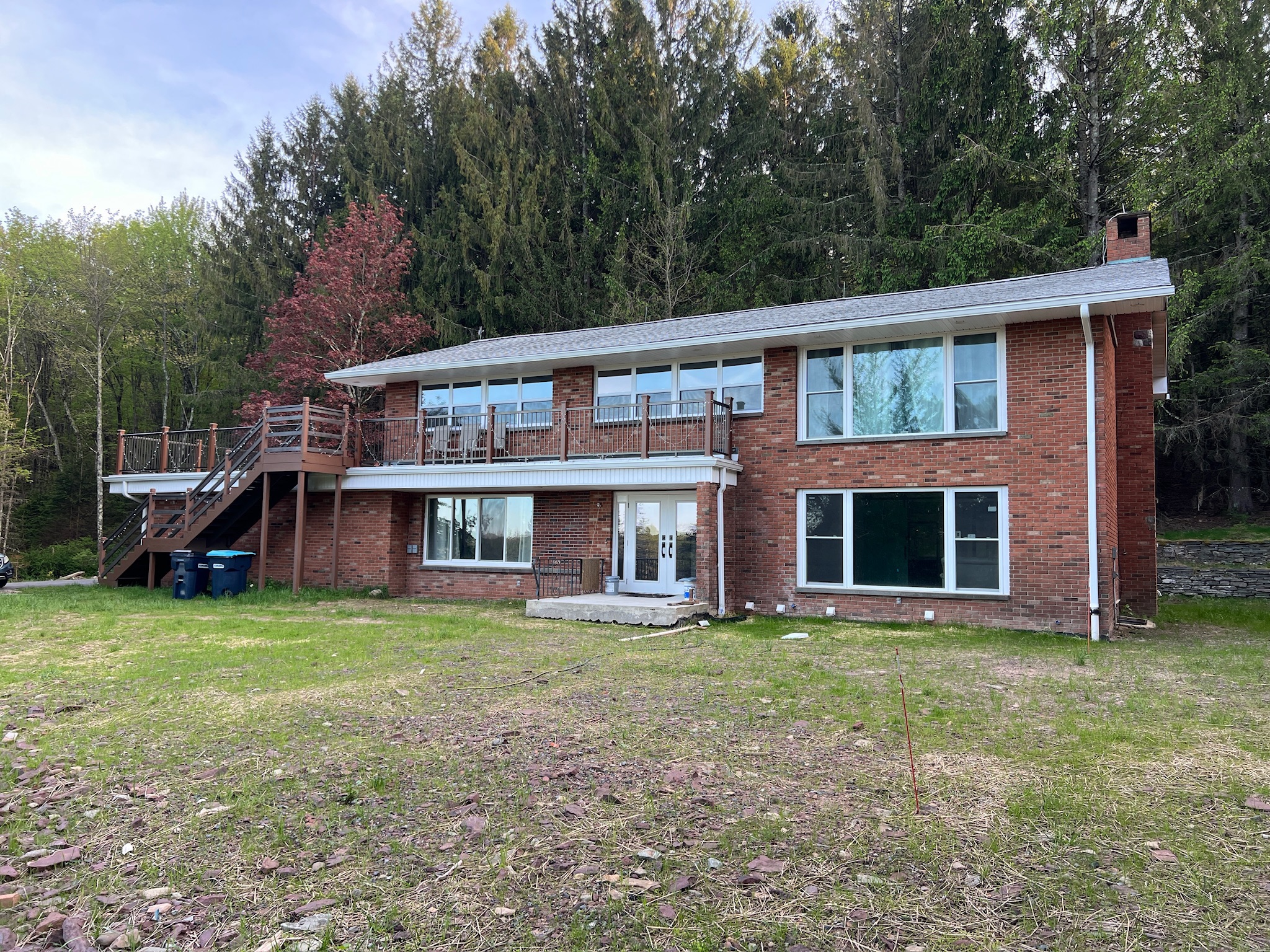 Exterior — wide view of First Light and deck