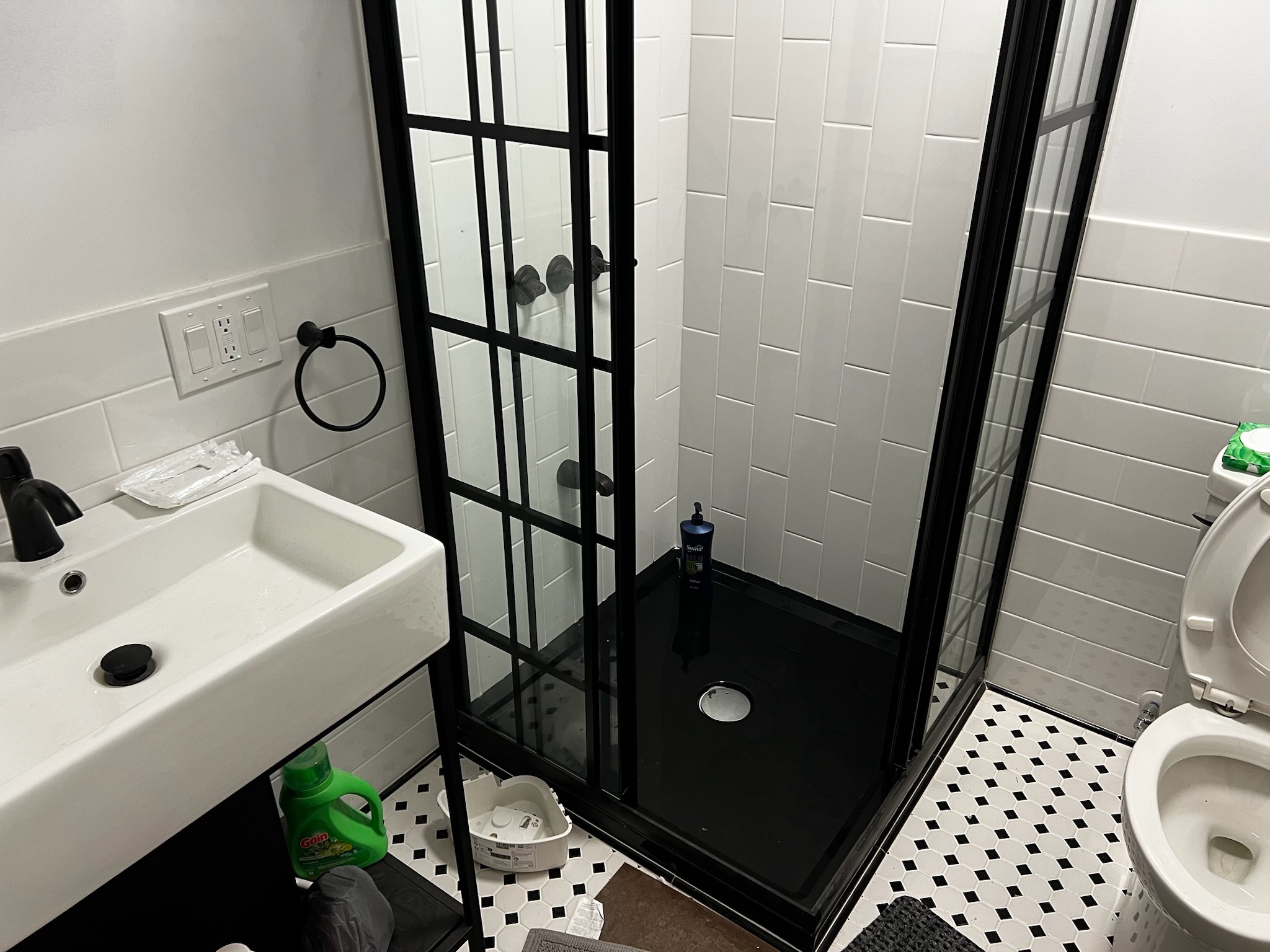 Bathroom with updated shower and sink at First Light
