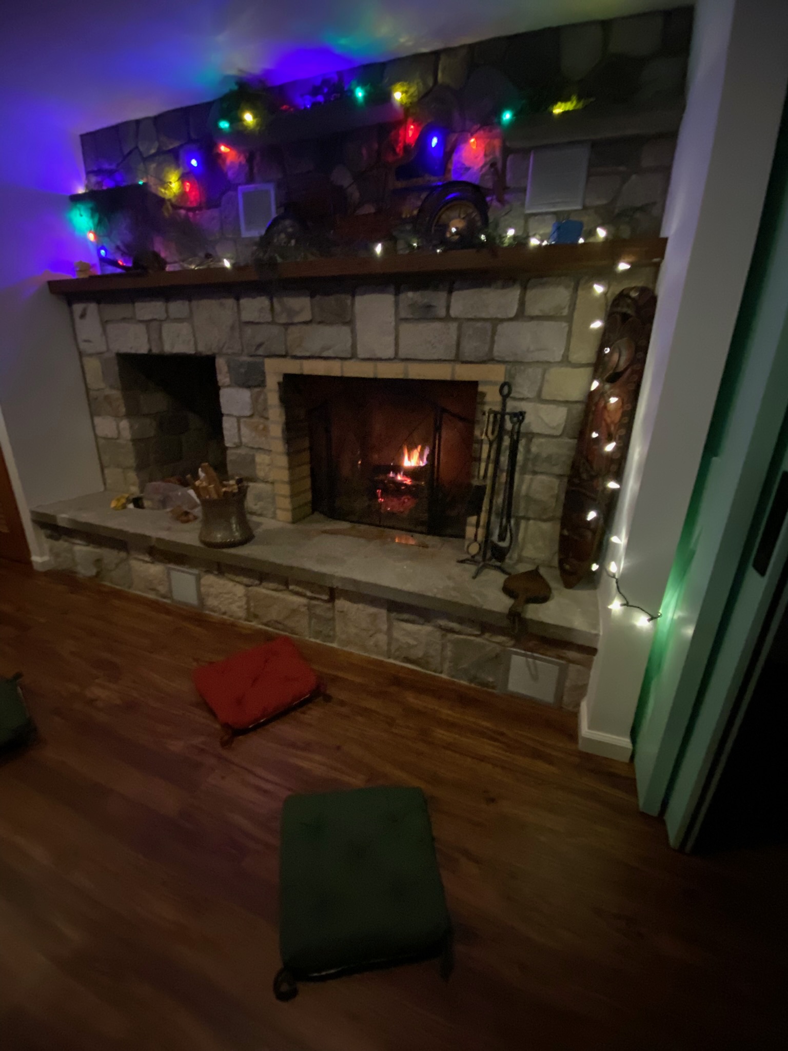 Stone fireplace in the living room at First Light