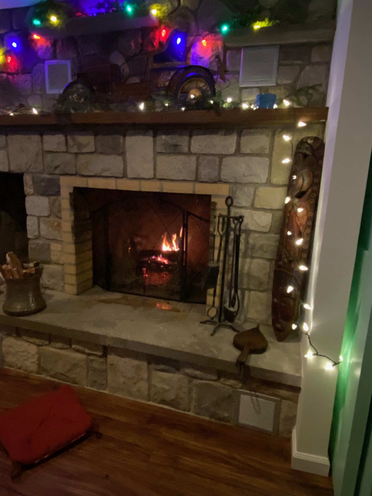 Living room and fireplace together at First Light