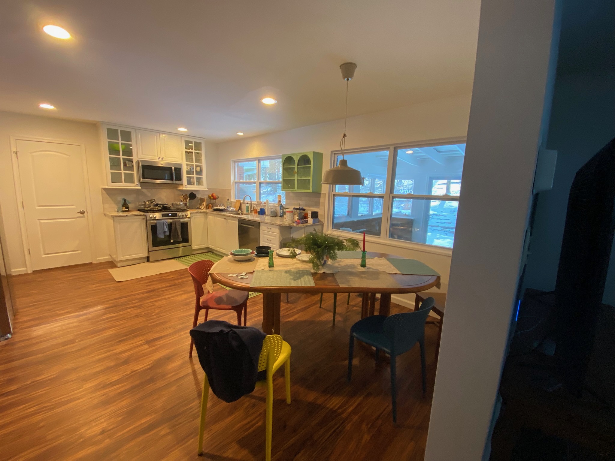 Dining room and kitchen wide view at First Light